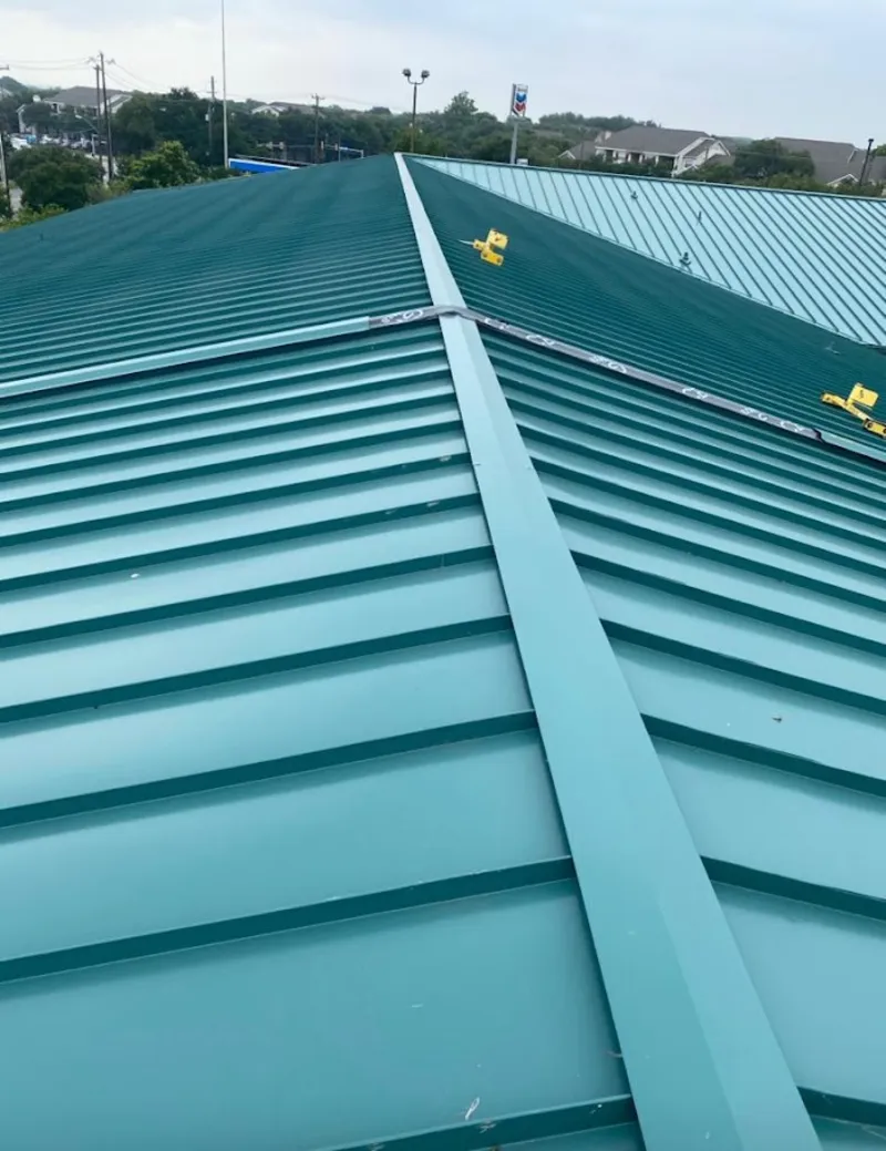 Green commercial metal roof ridge and valley for Metal Roof Repair in Clifton